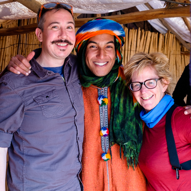 Berber guide welcomes tourists for their camel trek in Morocco | Barbara Cameron Pix | Food & Travel Photographer