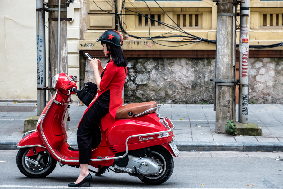 Vietnamese woman on red scooter, Hanoi, Vietnam | Barbara Cameron Pix | Food & Travel Photographer