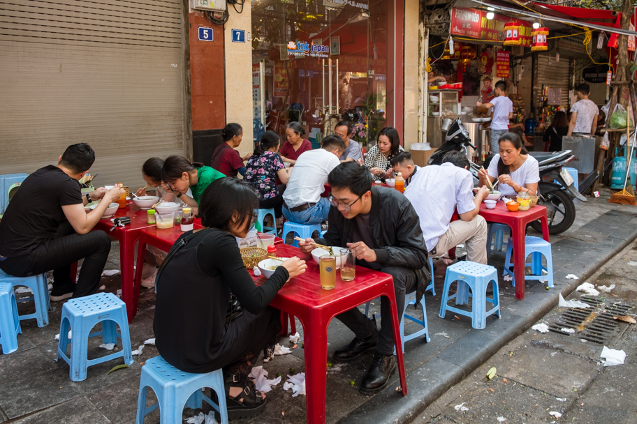 Outdoor restaurant tables & stools, Hanoi, Vietnam | Barbara Cameron Pix | Food & Travel Photographer