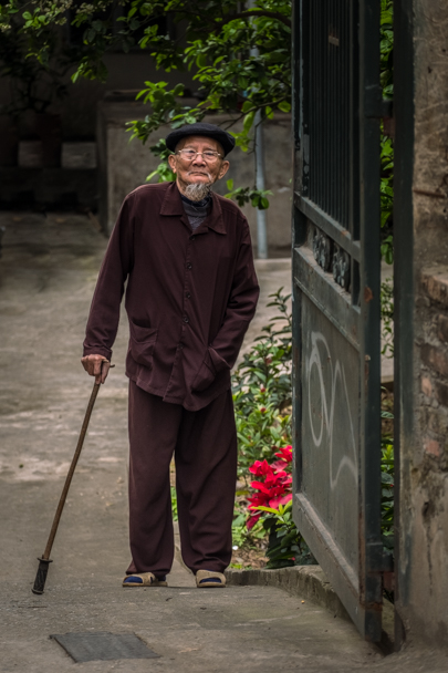 Older gentleman walking with cane, Hanoi, Vietnam | Barbara Cameron Pix | Food & Travel Photographer