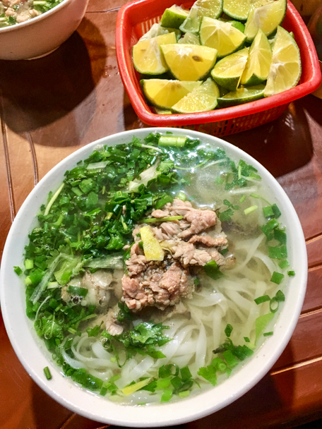 A full bowl of beef pho in Hanoi, Vietnam. Photo by Barbara Cameron Pix, Food & Travel Photographer