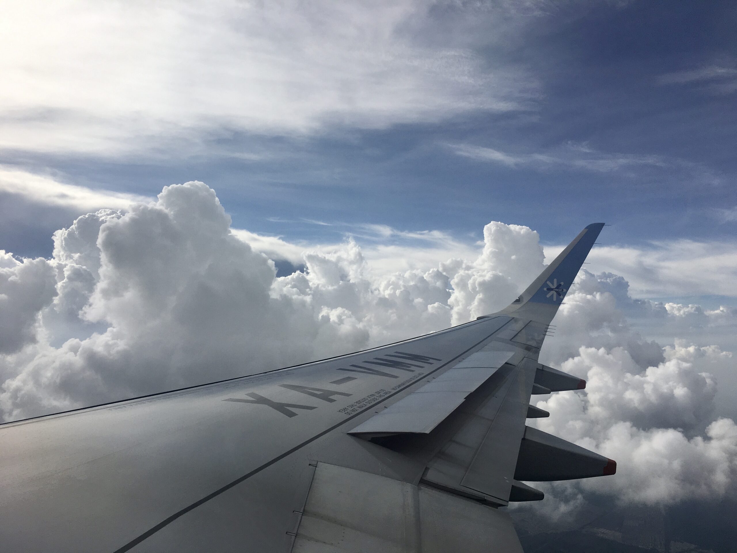 Looking out airplane window | Barbara Cameron Pix | Food & Travel Photographer